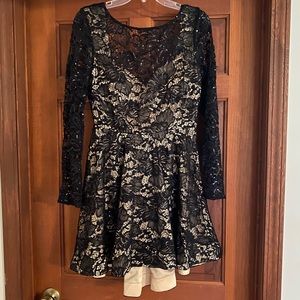 Black lace and nude dress